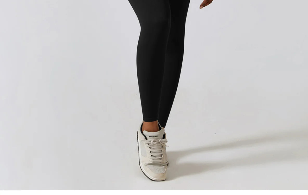 Close-up of sleeve cuff and thumbhole on the cropped top