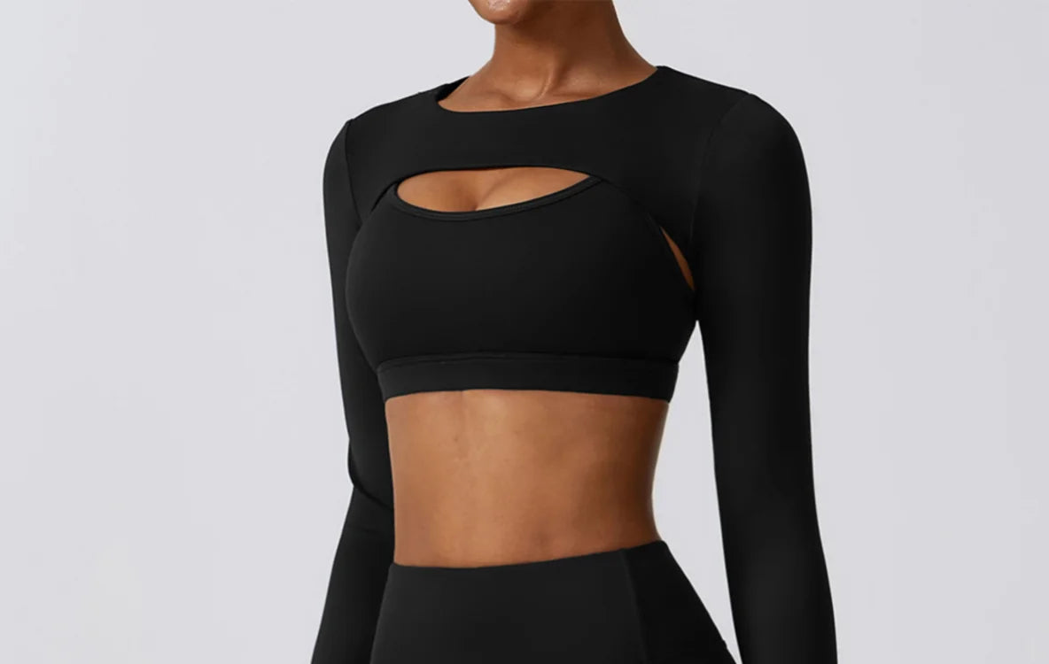 Woman posing outdoors in the long-sleeve activewear set
